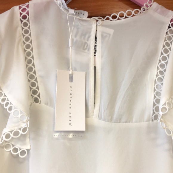 Circle trim blouse top - Picture 5 of 6